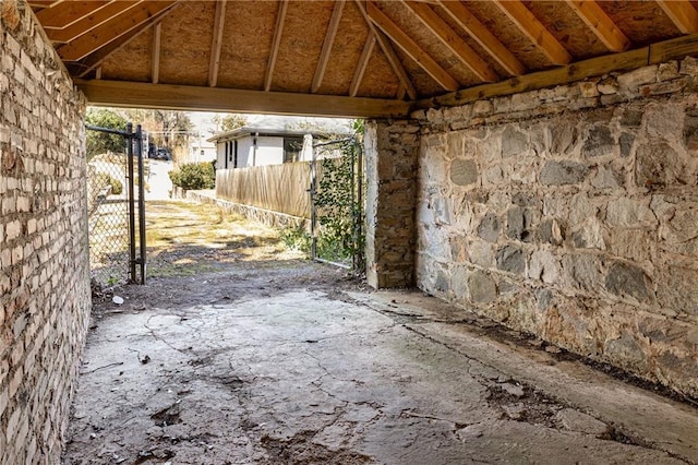 view of patio / terrace featuring fence