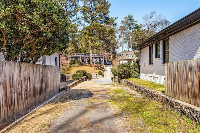 view of yard with fence