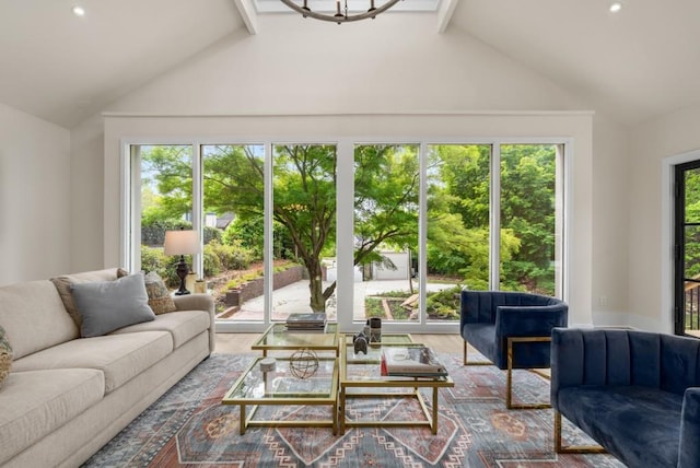 490 Rock Springs Rd NE, Atlanta, GA 30324 - living room featuring an inviting chandelier, high vaulted ceiling, light wood finished floors, and visible vents