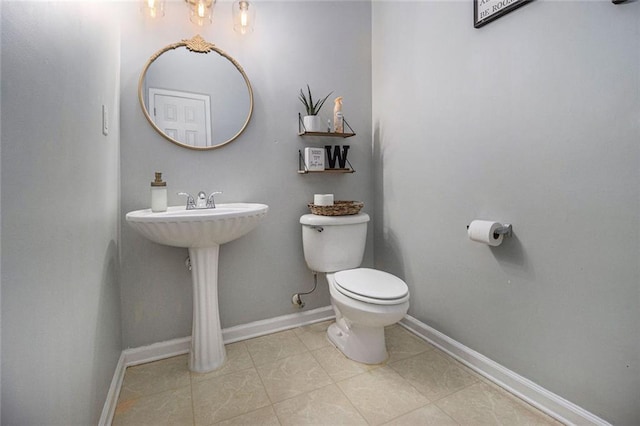 bathroom featuring toilet