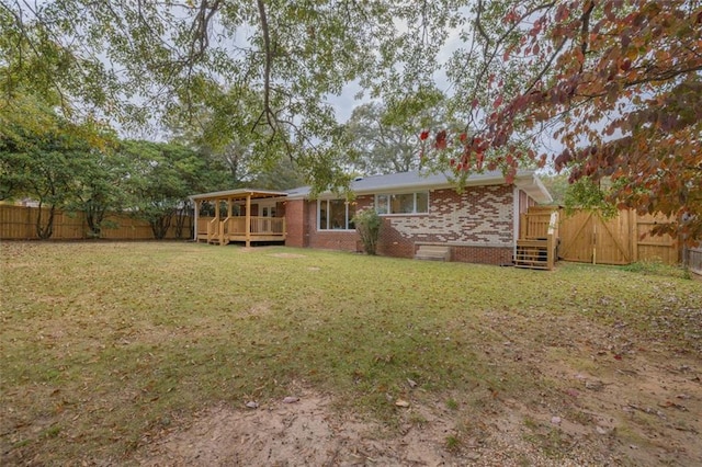 view of yard with a deck