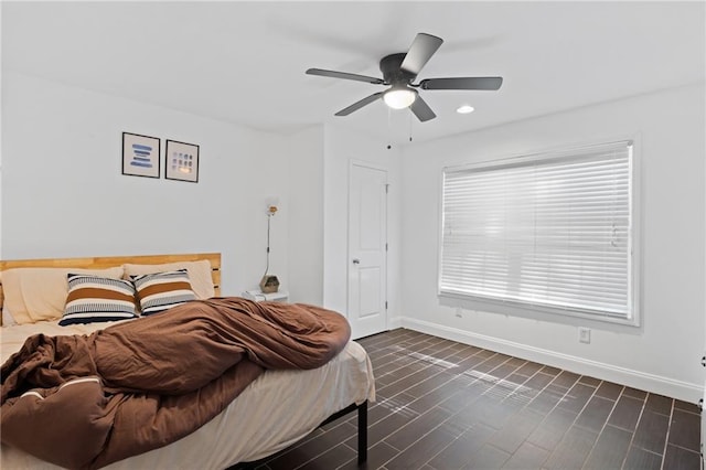 bedroom featuring baseboards, recessed lighting, and a ceiling fan