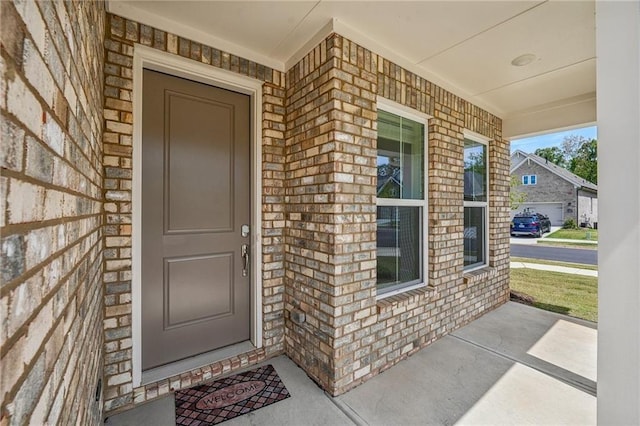 entrance to property with covered porch