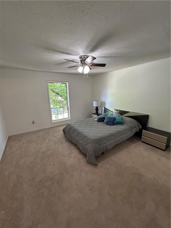 6851 Roswell Rd Unit O10, Atlanta, GA 30328 - carpeted bedroom featuring a textured ceiling and ceiling fan