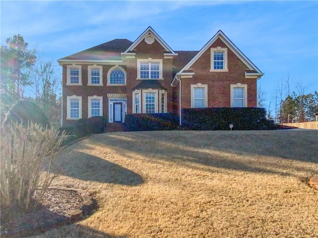 view of front of home featuring a front lawn