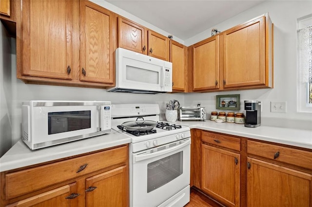 kitchen featuring white appliances