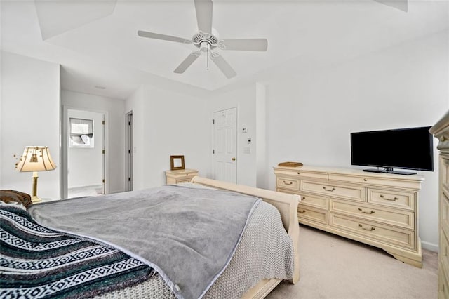 bedroom featuring ceiling fan and light carpet