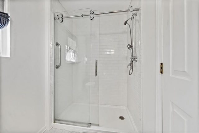 bathroom with an enclosed shower