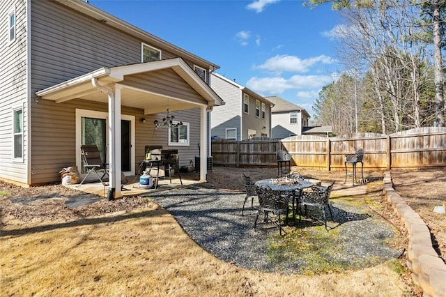 back of property featuring a patio area