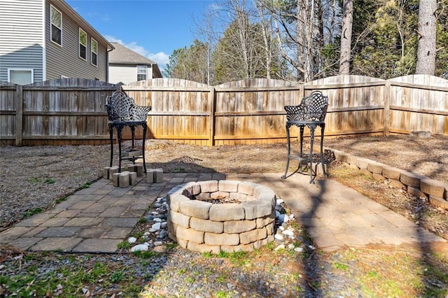 view of patio / terrace with a fire pit