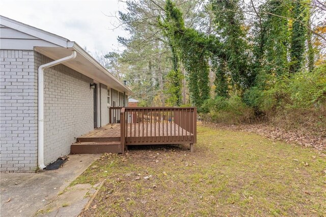 453 Utoy Cir SW, Atlanta, GA 30331 - view of yard with a wooden deck