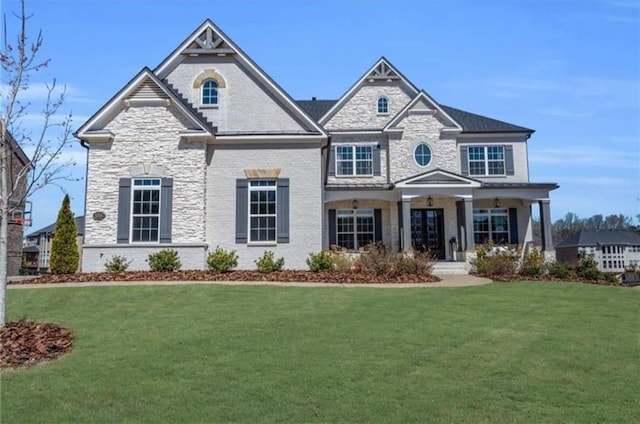 6355 Westfallen Overlook, Cumming, GA 30040 - craftsman house featuring a front lawn, a porch, and stone siding