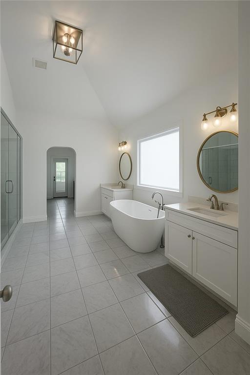 6355 Westfallen Overlook, Cumming, GA 30040 - bathroom featuring tile patterned floors, vanity, and plenty of natural light