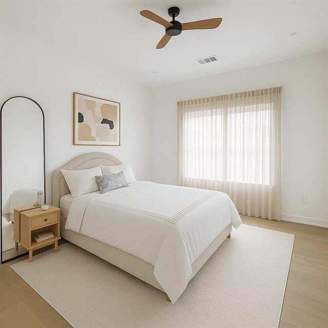 6355 Westfallen Overlook, Cumming, GA 30040 - bedroom featuring light wood finished floors, visible vents, baseboards, and a ceiling fan