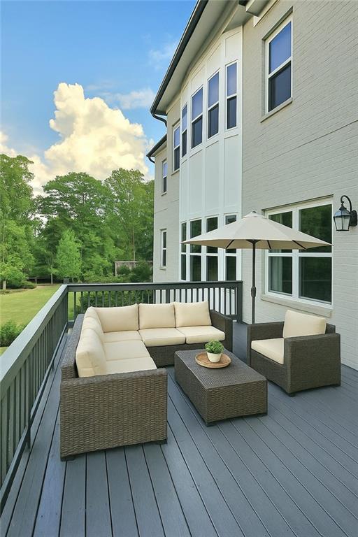 6355 Westfallen Overlook, Cumming, GA 30040 - wooden deck with an outdoor living space