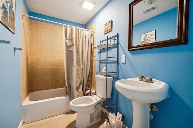 bathroom with toilet, shower / bathtub combination with curtain, and tile patterned flooring