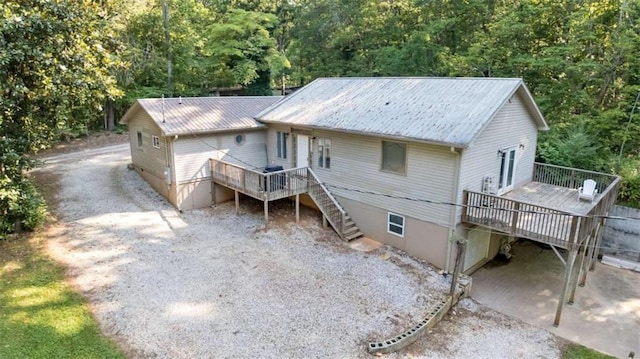 170 Early Sundown Rd, Clarkesville, GA 30523 - back of house featuring a deck, stairs, a forest view, and a metal roof