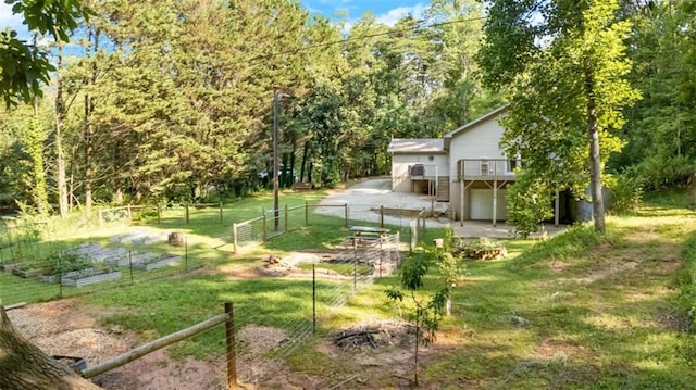170 Early Sundown Rd, Clarkesville, GA 30523 - view of yard featuring a garden, a deck, and a wooded view