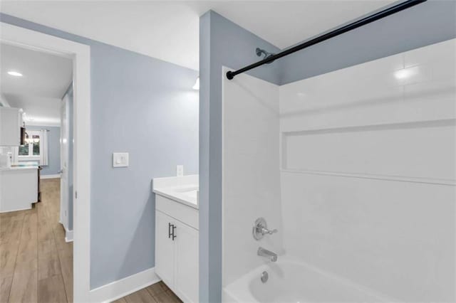 170 Early Sundown Rd, Clarkesville, GA 30523 - bathroom with vanity, shower / washtub combination, and wood finished floors
