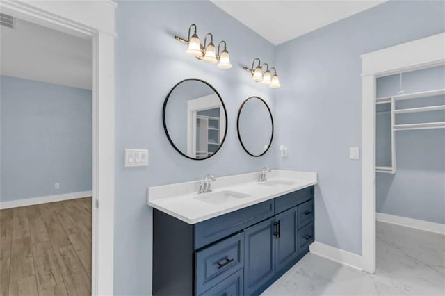 170 Early Sundown Rd, Clarkesville, GA 30523 - bathroom featuring double vanity and baseboards