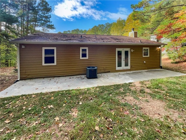 back of house featuring a patio, french doors, and central air condition unit