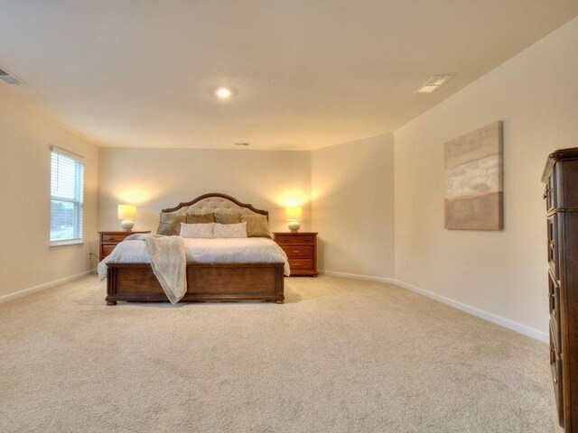 799 Blue Juniper Cir, Loganville, GA 30052 - bedroom featuring light carpet and baseboards
