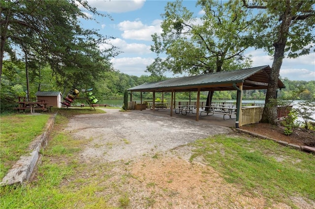 property view of water with a wooded view