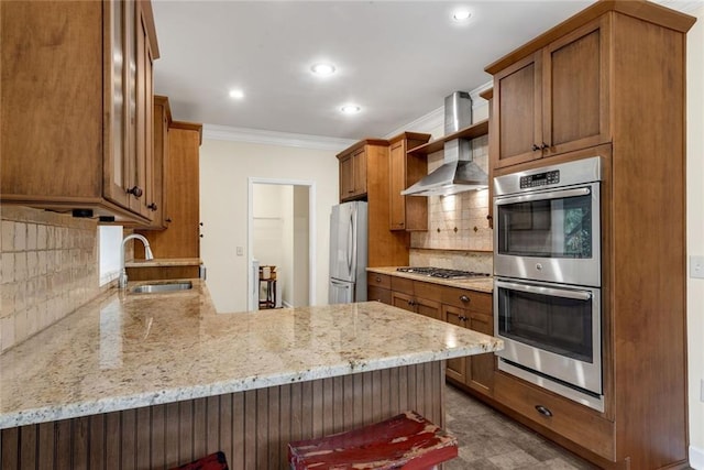 130 Wayne Wheeler Way, Woodstock, GA 30188 - kitchen featuring stainless steel appliances, crown molding, a peninsula, decorative backsplash, and light stone counters