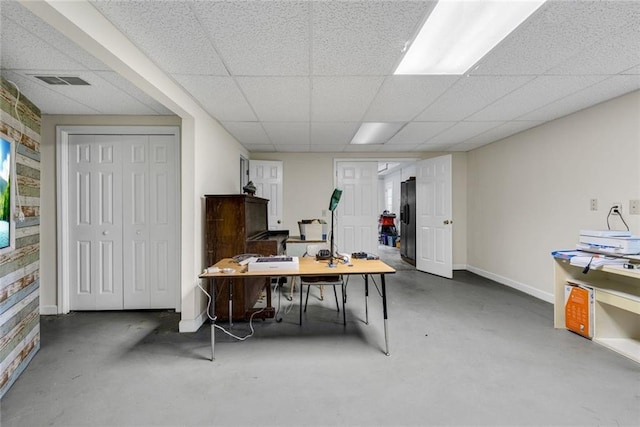 130 Wayne Wheeler Way, Woodstock, GA 30188 - home office with concrete floors and a paneled ceiling
