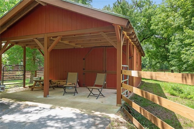 130 Wayne Wheeler Way, Woodstock, GA 30188 - view of patio featuring an outbuilding