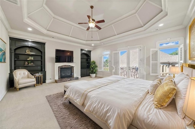 carpeted bedroom with visible vents, a glass covered fireplace, ornamental molding, access to outside, and french doors