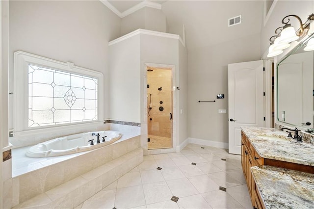 full bath featuring a high ceiling, visible vents, a shower stall, a bath, and crown molding