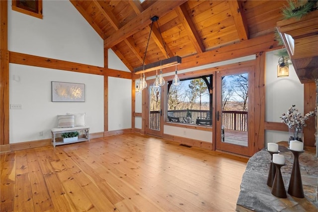 8850 Matt Hwy, Ball Ground, GA 30107 - living area featuring wood-type flooring, wooden ceiling with exposed beams, high vaulted ceiling, and baseboards