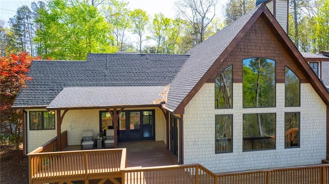 8850 Matt Hwy, Ball Ground, GA 30107 - back of property featuring a deck, a chimney, and roof with shingles