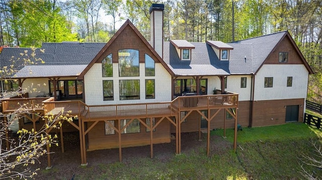 8850 Matt Hwy, Ball Ground, GA 30107 - back of house with a chimney, a deck, and roof with shingles
