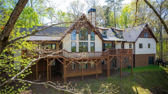 8850 Matt Hwy, Ball Ground, GA 30107 - rear view of property with a wooden deck, a chimney, and stairs