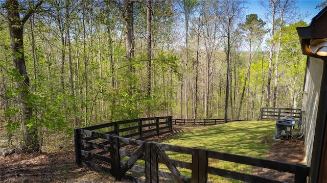 8850 Matt Hwy, Ball Ground, GA 30107 - view of yard with central air condition unit and a view of trees