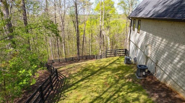 8850 Matt Hwy, Ball Ground, GA 30107 - view of yard featuring cooling unit and a wooded view