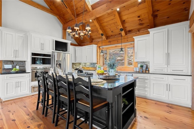 8850 Matt Hwy, Ball Ground, GA 30107 - kitchen with wood ceiling with exposed beams, a chandelier, tasteful backsplash, stainless steel fridge, and white cabinetry