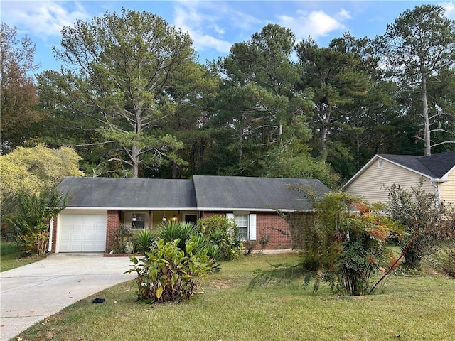 single story home with a garage and a front lawn