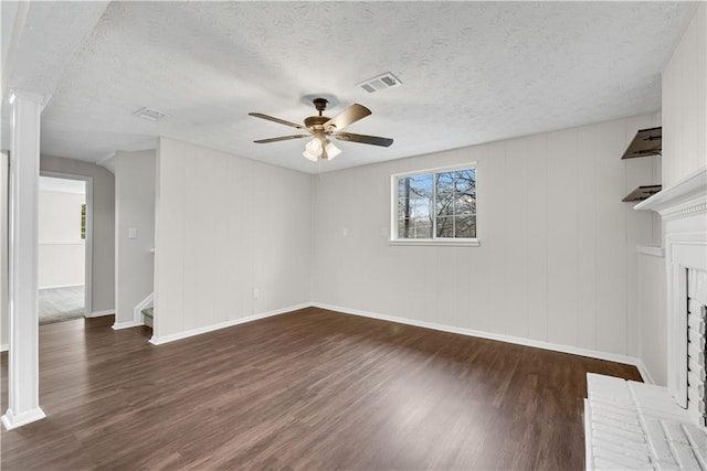 3414 Dearwood Dr SW, Lilburn, GA 30047 - unfurnished living room with a ceiling fan, dark wood-style floors, a fireplace, baseboards, and stairway
