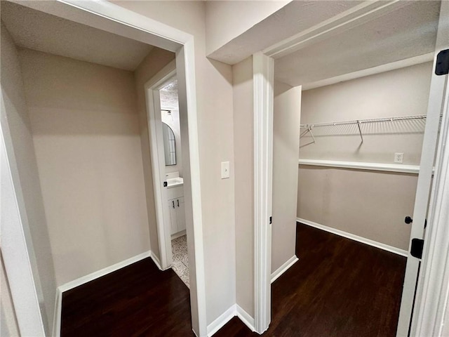 3414 Dearwood Dr SW, Lilburn, GA 30047 - hall with wood finished floors and baseboards