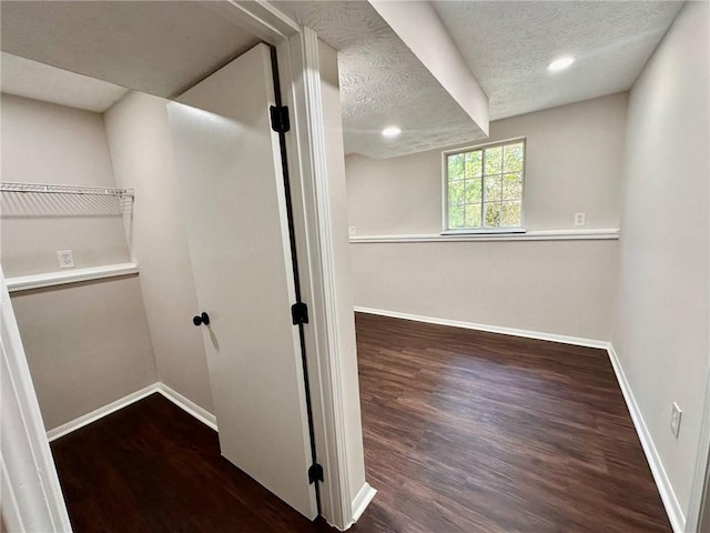 3414 Dearwood Dr SW, Lilburn, GA 30047 - interior space featuring baseboards, wood finished floors, a textured ceiling, and recessed lighting