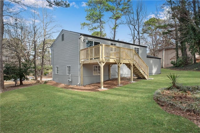 3414 Dearwood Dr SW, Lilburn, GA 30047 - back of house featuring a deck, stairs, and a yard