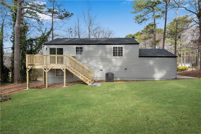 3414 Dearwood Dr SW, Lilburn, GA 30047 - back of house featuring a deck, a lawn, stairs, cooling unit, and a shingled roof