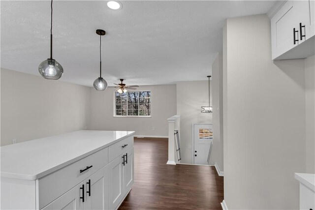 3414 Dearwood Dr SW, Lilburn, GA 30047 - kitchen with stainless steel appliances, a sink, backsplash, dark wood finished floors, and light countertops