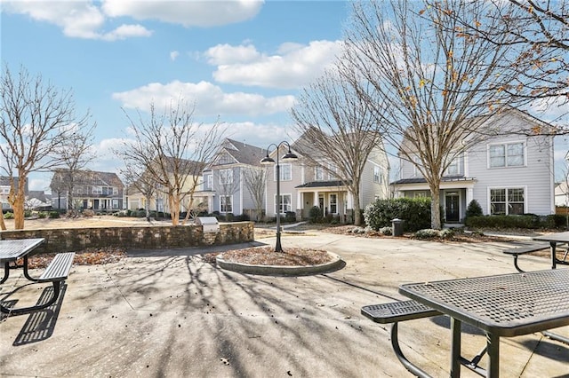 view of home's community featuring a patio