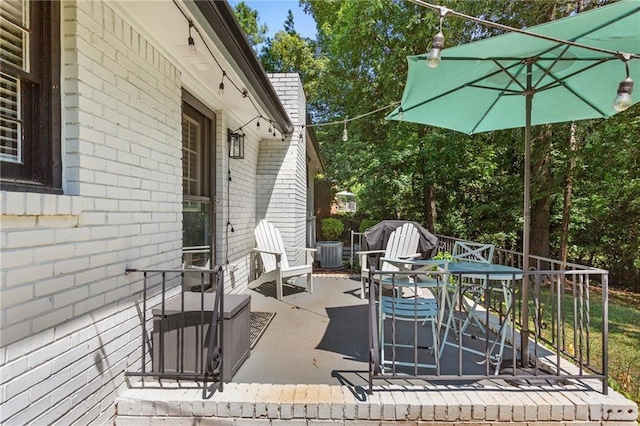 view of patio featuring central air condition unit