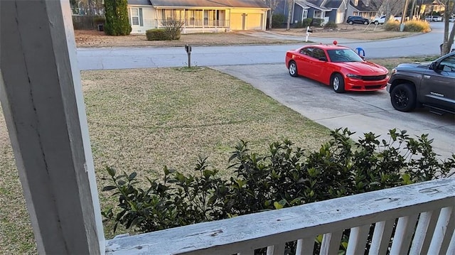 view of yard featuring a residential view