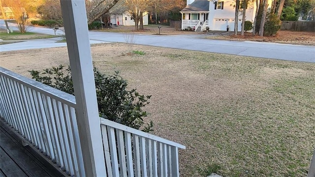 view of yard featuring concrete driveway